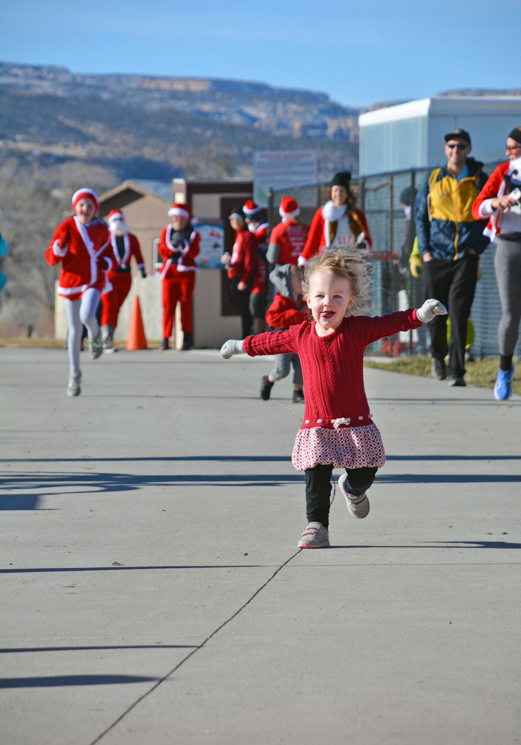 Children running to the finish line of the race