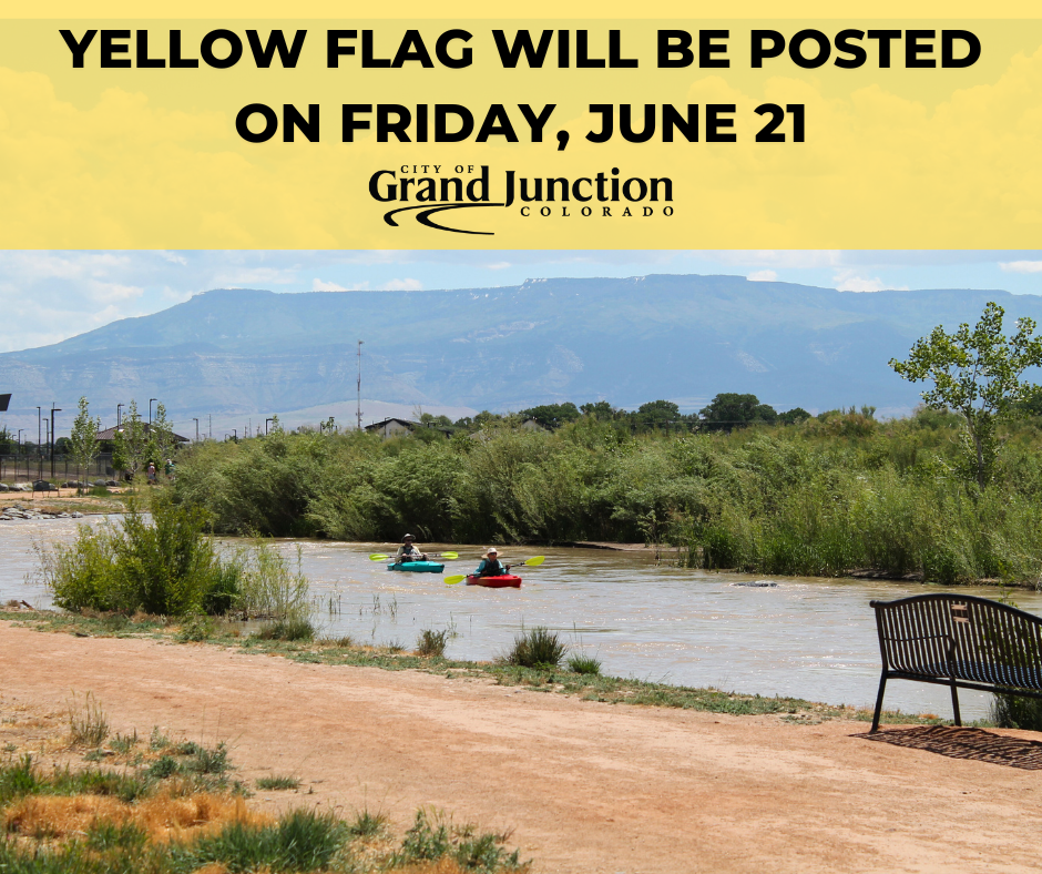 Two community members float down the River Park at Las Colonias in kayaks