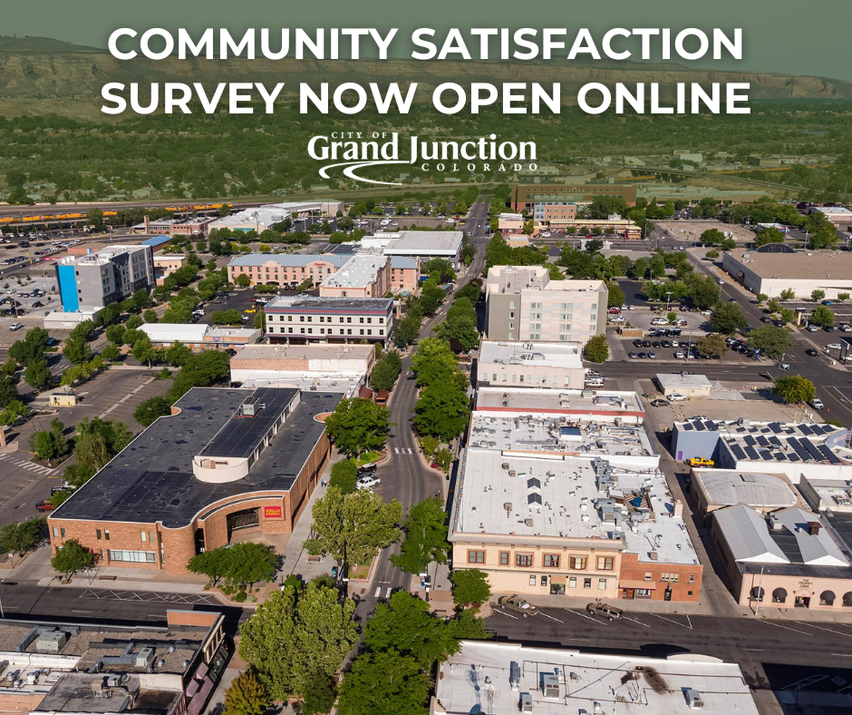 An aerial view of downtown of grand junction. text on graphic.  