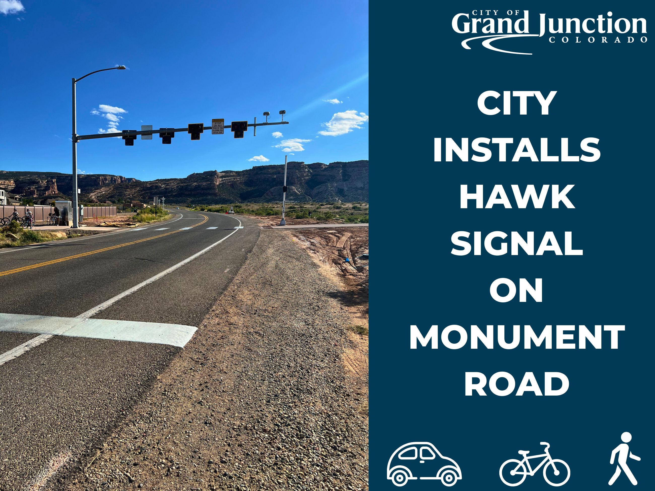 A road with a new pedestrian signal installed. 