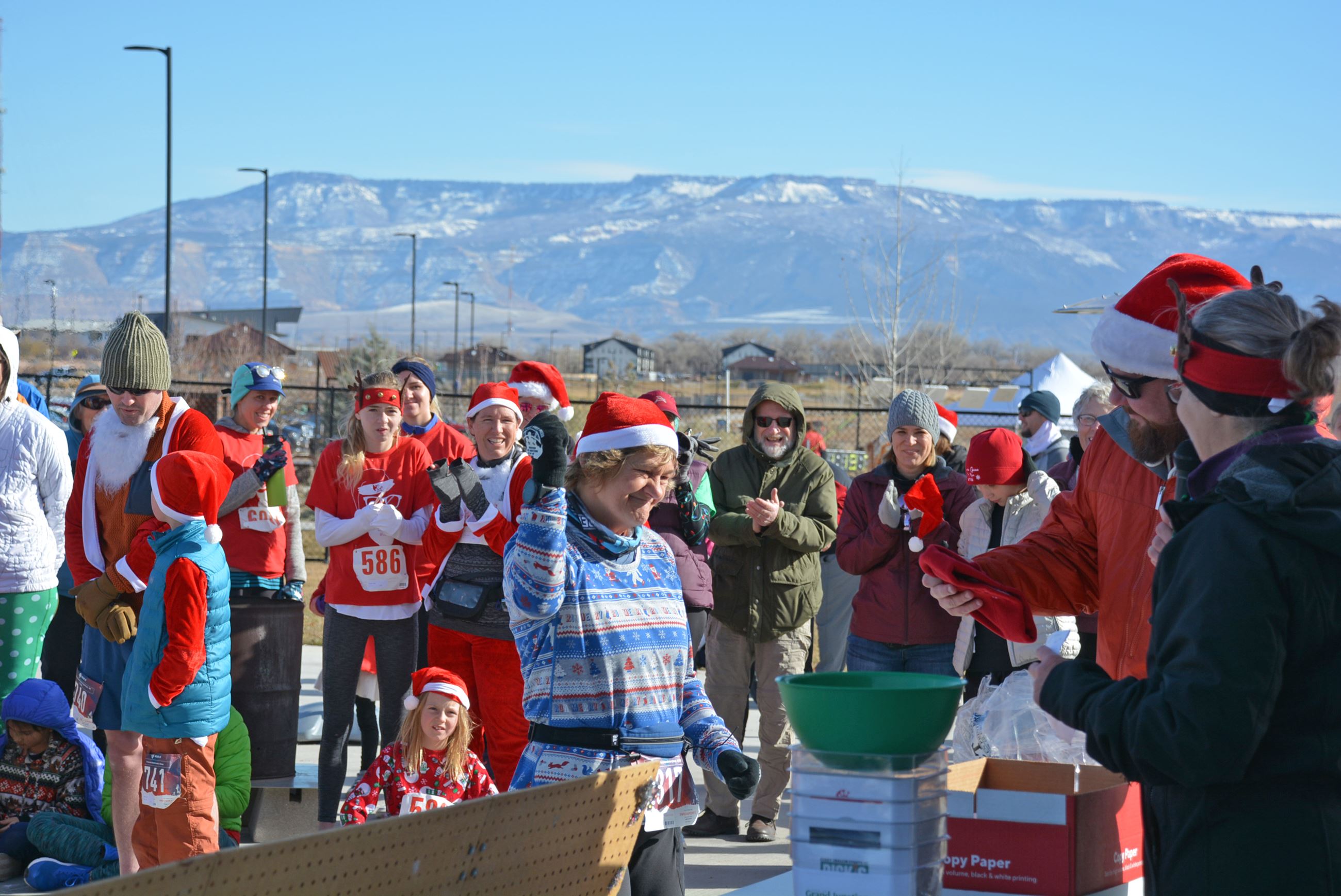 Person accepting award for winning in age group