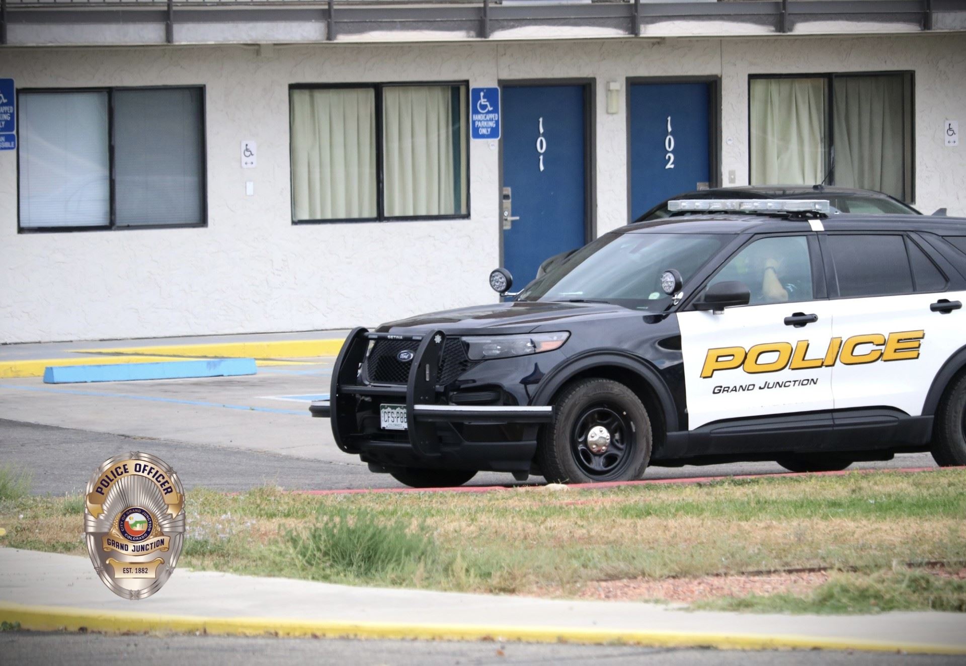 GJPD patrol car outside a hotel